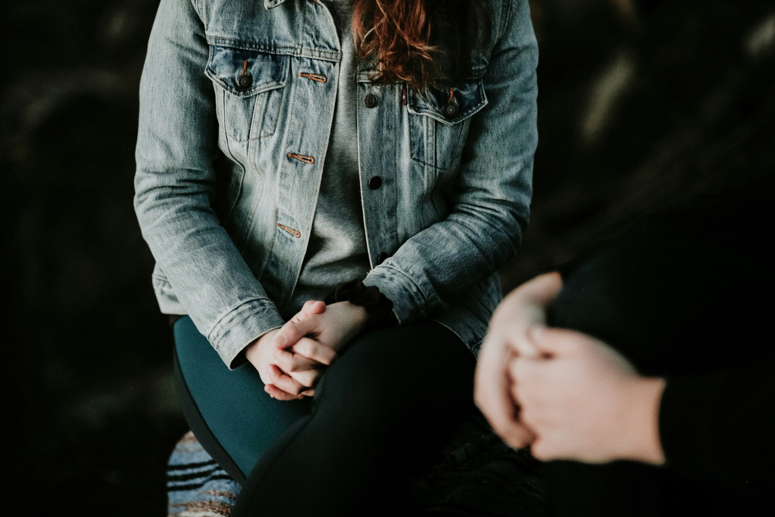 a woman discussing mental health at work